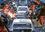 In the industrial production workshop, the robot arm of the automobile production line is working