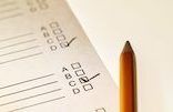 Close-up of school report and pen